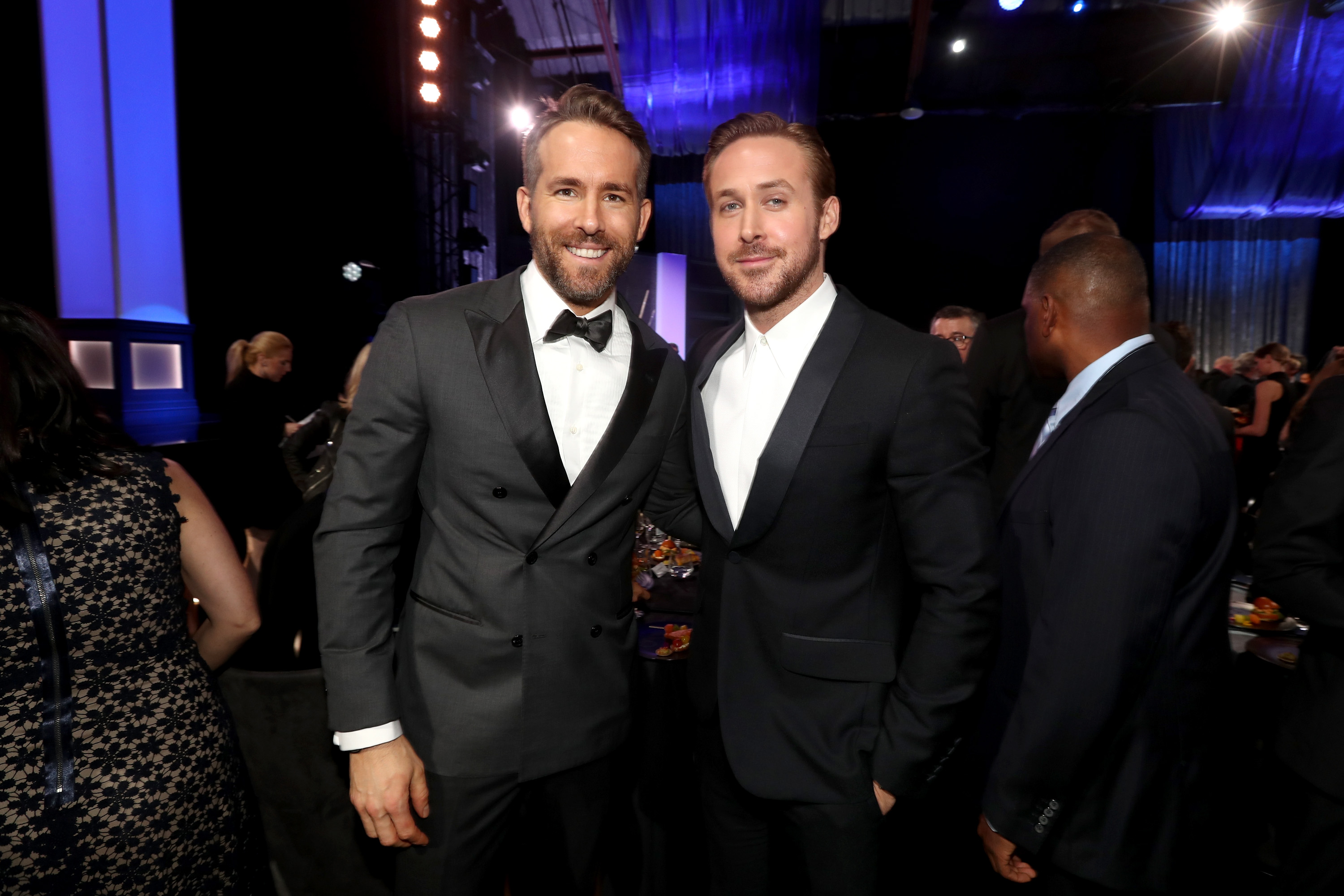 SANTA MONICA, CA - DECEMBER 11: Actors Ryan Reynolds (L) and Ryan Gosling attend The 22nd Annual Critics' Choice Awards at Barker Hangar on December 11, 2016 in Santa Monica, California. (Photo by Christopher Polk/Getty Images for The Critics' Choice Awards )