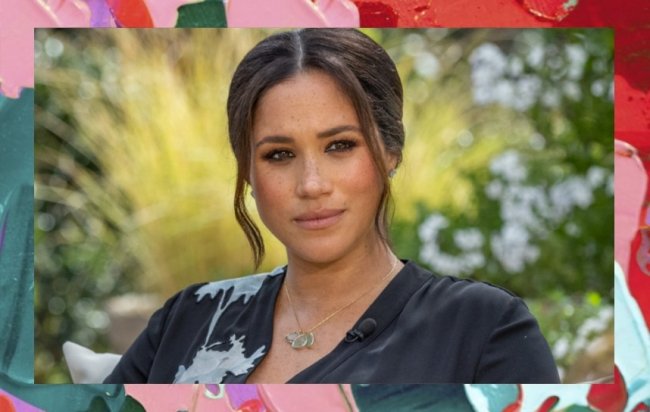 Meghan Markle em entrevista para Oprah. Ela olha para o lado com expressão neutra