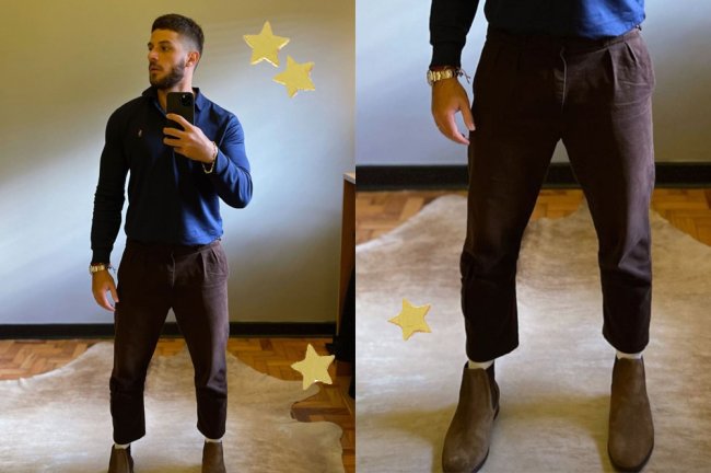crushes vestindo calça curte que vão te fazer ver a peça com outros olhos Chay Suede tirando uma foto no espelho; ele usa uma calça cigarrete marrom e uma camisa social azul de manga longa