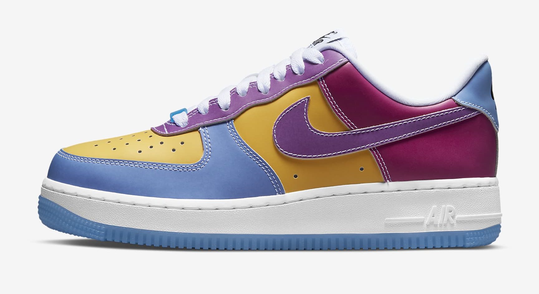 Tênis da Air Force 1, da Nike, em tons de roxo, magenta, mostarda e azul