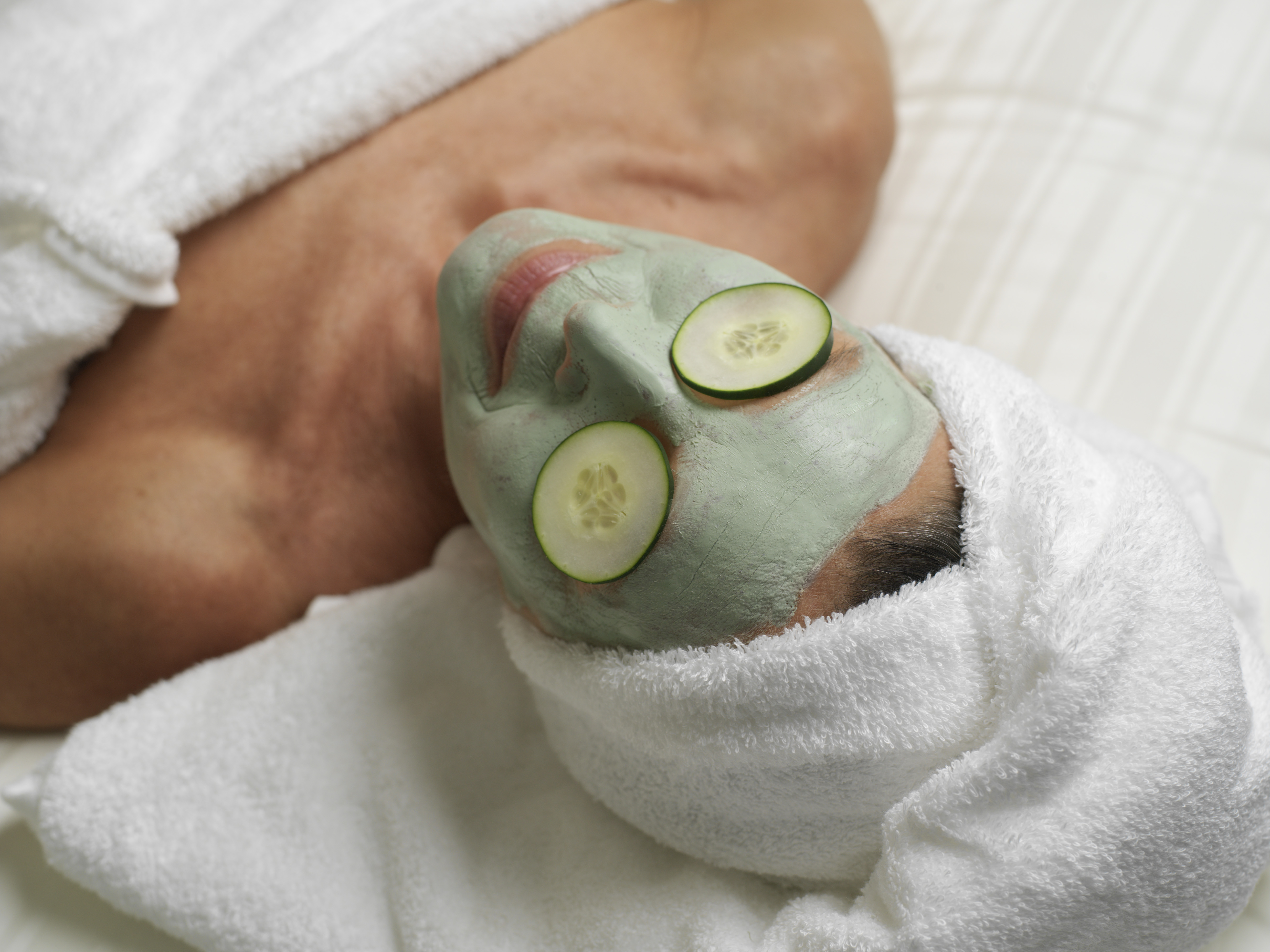 Woman wearing beauty mask ...