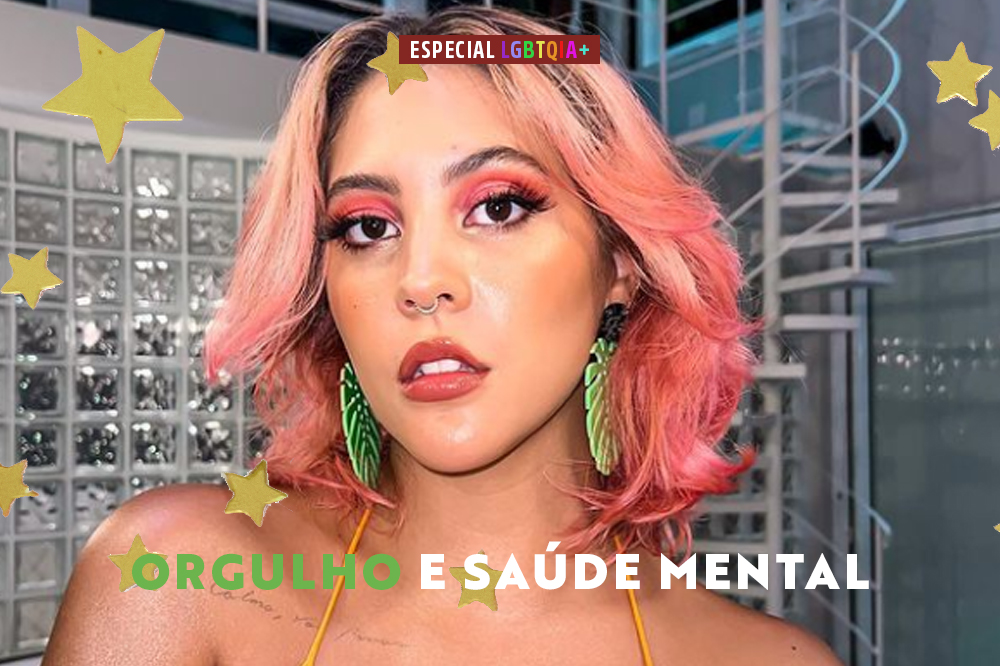 Foto de Dora Figueiredo. Ela é uma mulher branca e tem o cabelo rosa