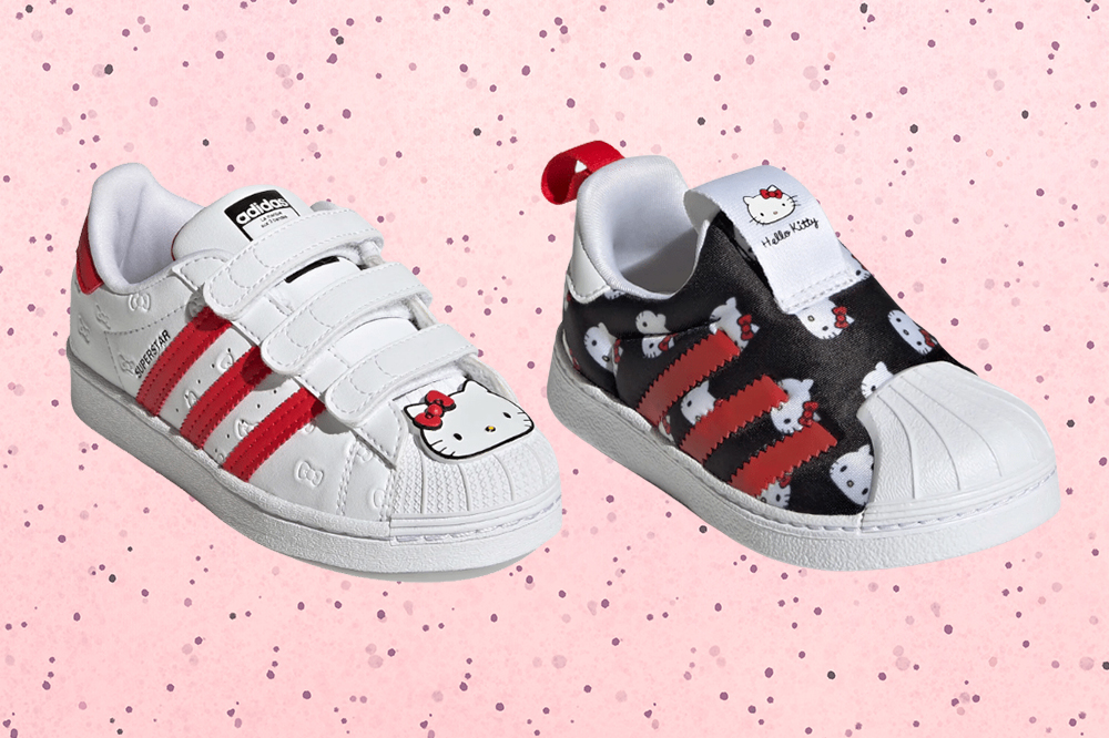 tenis-colecao-adidas-hello-kitty-05 Dois tênis Superstar da coleção da Adidas com a Hello Kitty em fundo rosa com bolinhas