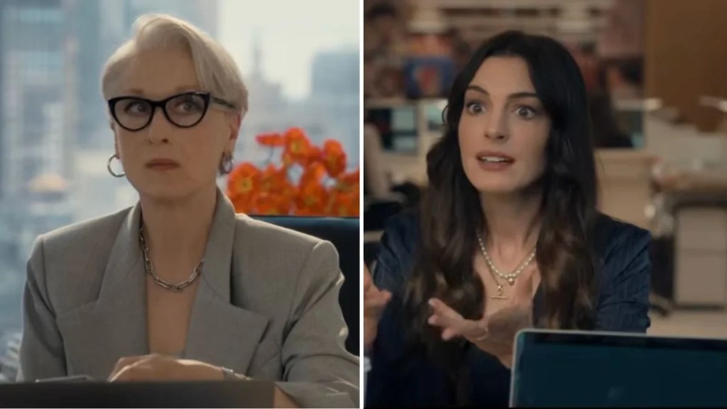 Meryl Streep, com cabelo grisalho curto e óculos pretos, veste blazer cinza e colar prateado, olhando séria. Ao lado, Anne Hathaway, com cabelo castanho longo, colar dourado e blusa escura, gesticula surpresa com a boca aberta