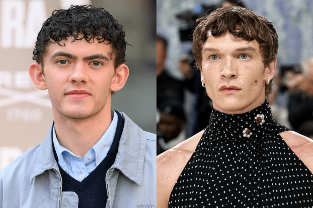 Colagem de dois homens jovens. À esquerda, um homem de cabelo cacheado escuro, camisa azul clara, suéter azul marinho e jaqueta cinza. À direita, um homem de cabelo castanho ondulado, usando um top preto de bolinhas brancas com gola alta e broches, e brincos de argola